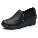 Chaussures à talons compensés en cuir pour femmes